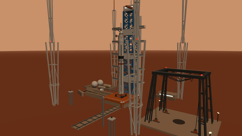 The booster vertical on its orange launch table with the blue service tower
